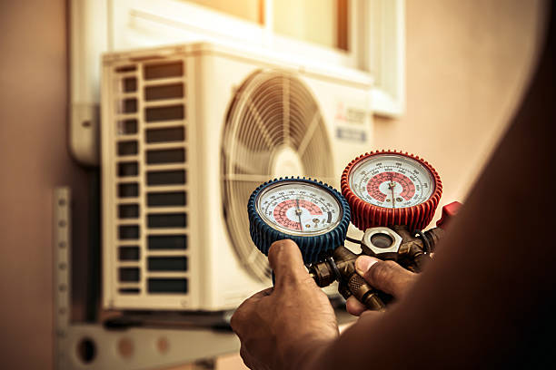 Professional Air Conditioning Service technician working in Rockwall, TX